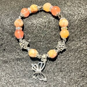 Pink glass and natural stone star and butterfly bracelet